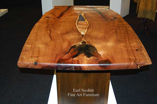 unique live edge table from one end showing bookmatched Sonoran Honey Mesquite slabs
